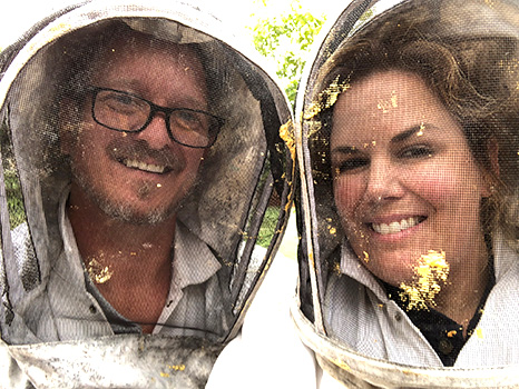 Male and female bee relocation experts providing safe honey bee removal services in Austin TX